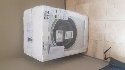 Recibi un lavarropa abollado y rayado