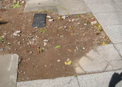 Reparar la vereda rota frente a mi domicilio