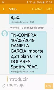 Dar de baja el debito en dolar de la empresa spotify de mi tarjeta  naranjavisa