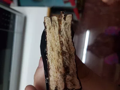 Le falta una capa de dulce de leche