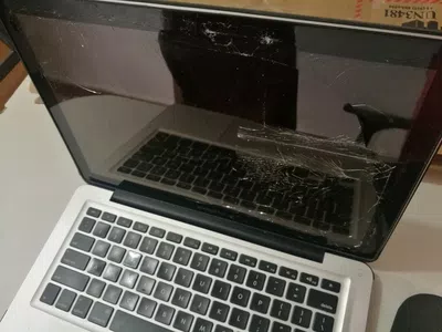 Oca destruyo macbook pro enviada por mercadoenvios